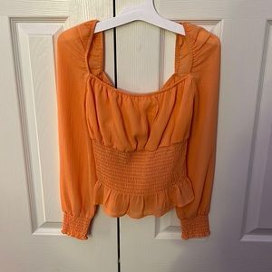 slightly cropped cute top, from Favlux